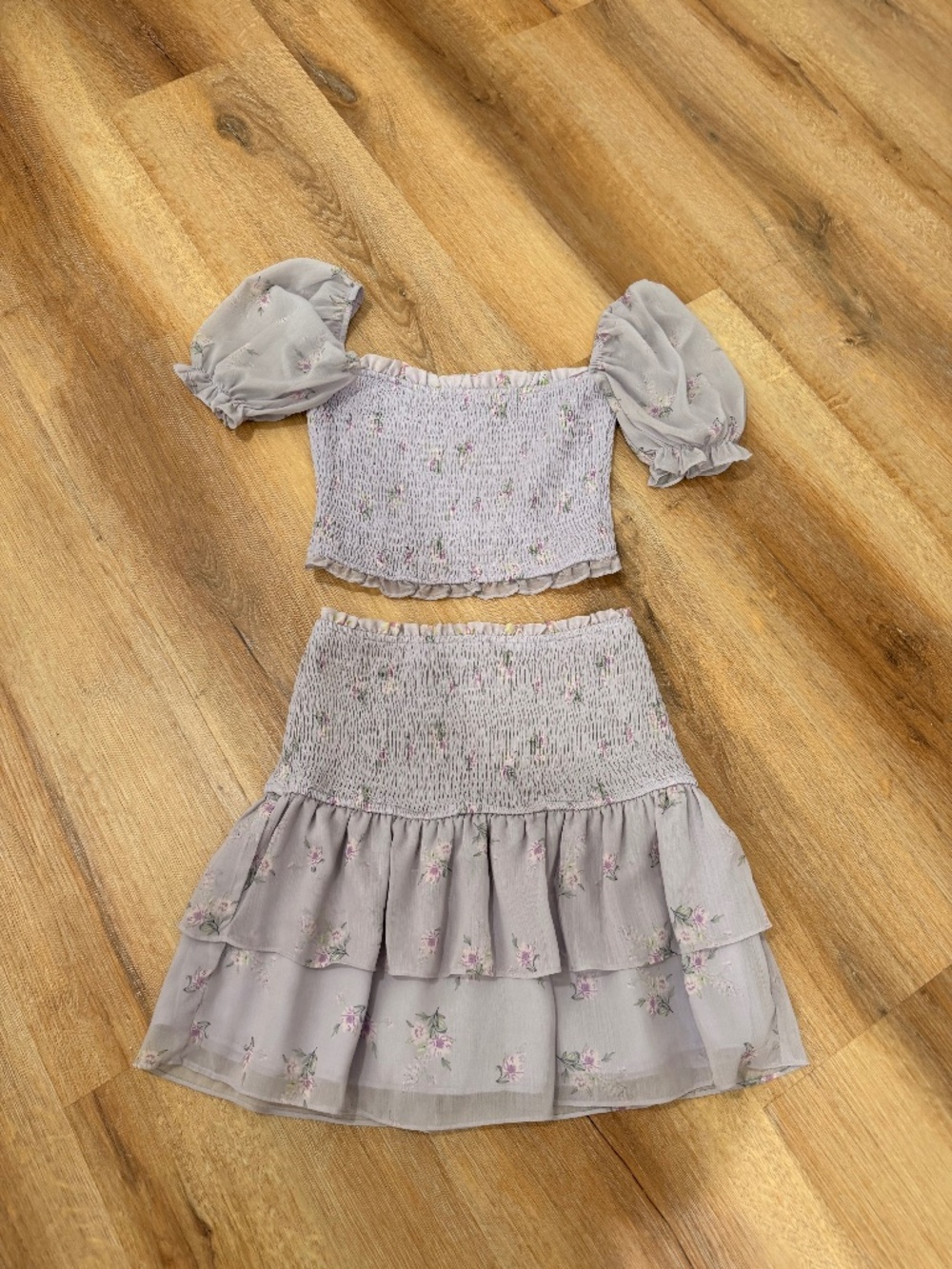 Lavender Floral ruffle mini skirt and puff sleeve top set by Storia